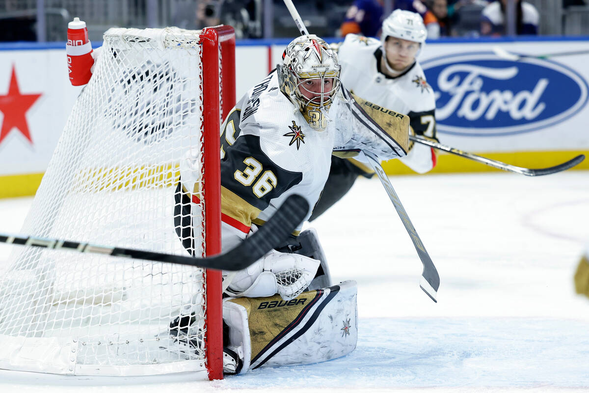 Vegas Golden Knights goaltender Logan Thompson (36) defends against the New York Islanders in t ...