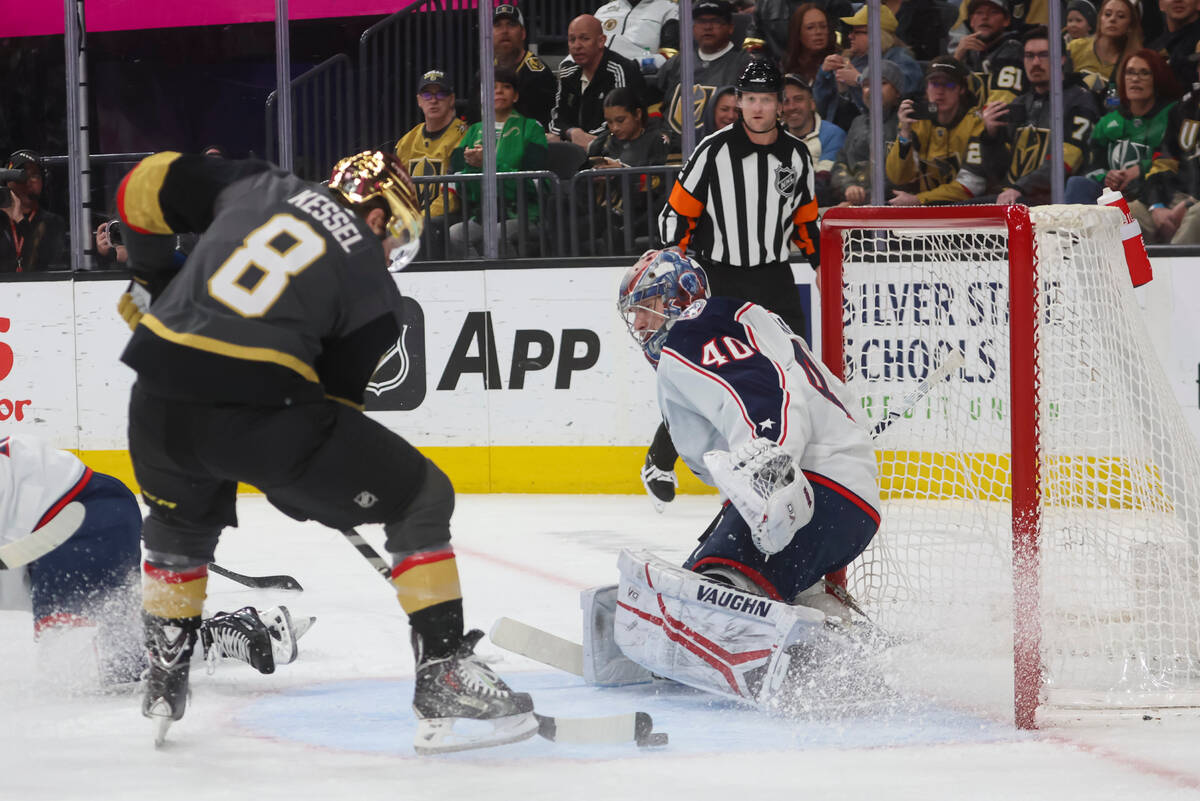 Golden Knights right wing Phil Kessel (8) shoots the puck to score against Columbus Blue Jacket ...