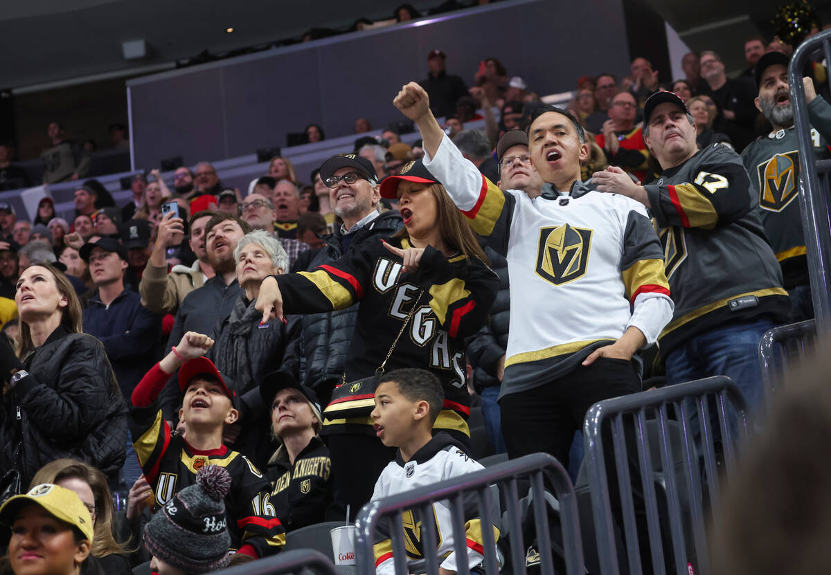 Golden Knights fans celebrate a goal against the Columbus Blue Jackets during the first period ...