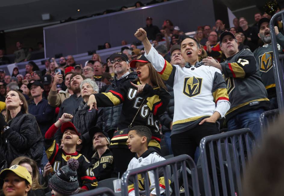Golden Knights fans celebrate a goal against the Columbus Blue Jackets during the first period ...