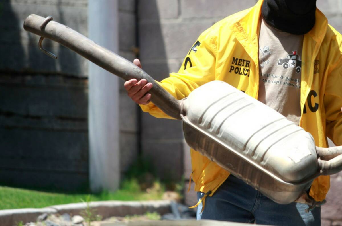 Metro police officers recover a catalytic converter in a Las Vegas raid in 2011. (Las Vegas Rev ...