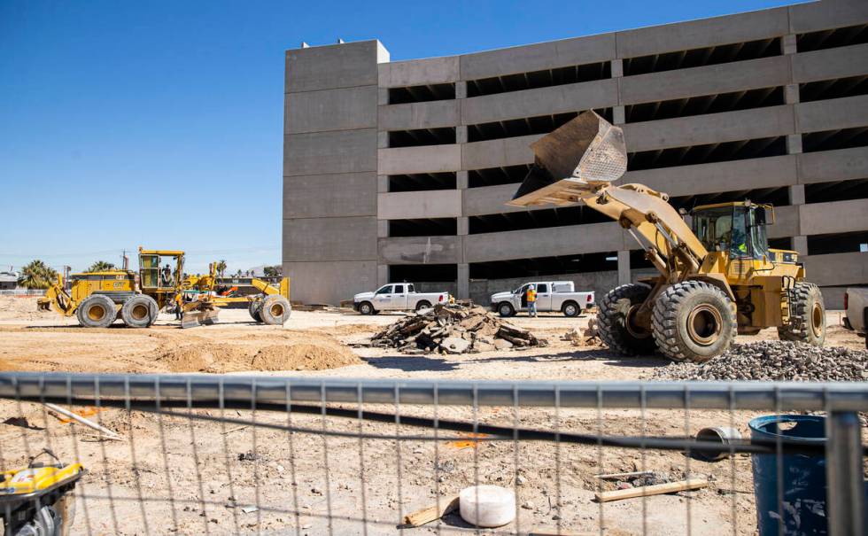 Construction continues on an apartment project by The Calida Group being built behind the renov ...