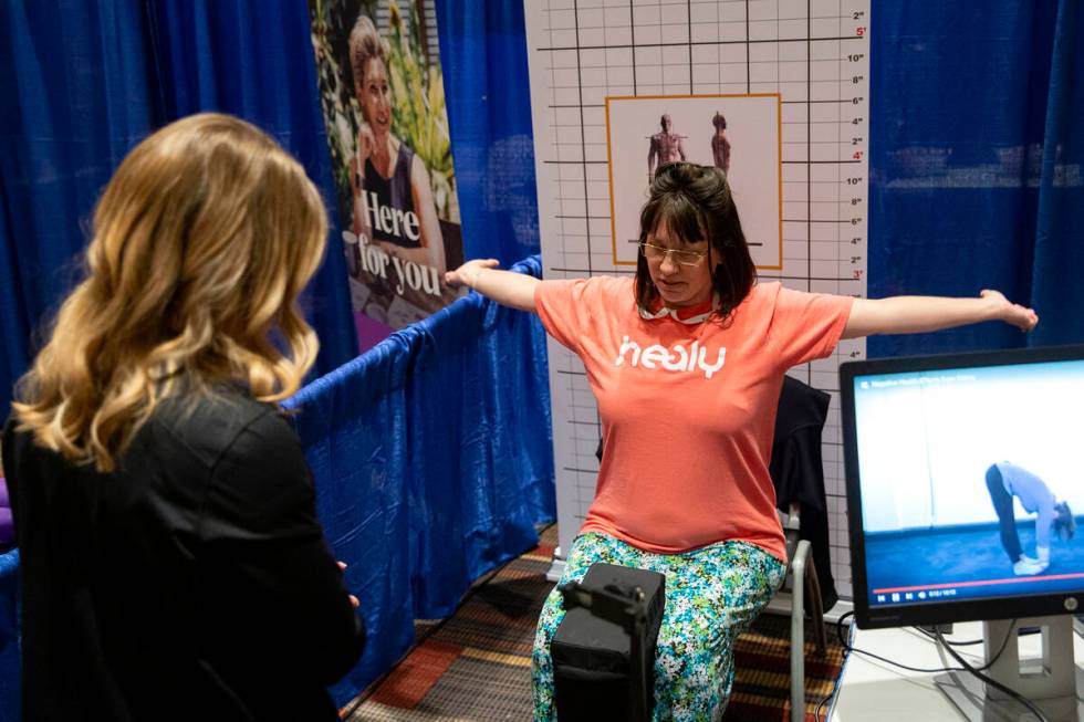 Kellie James participates in a posture evaluation with Amber Cherveny, clinic director at Egosc ...