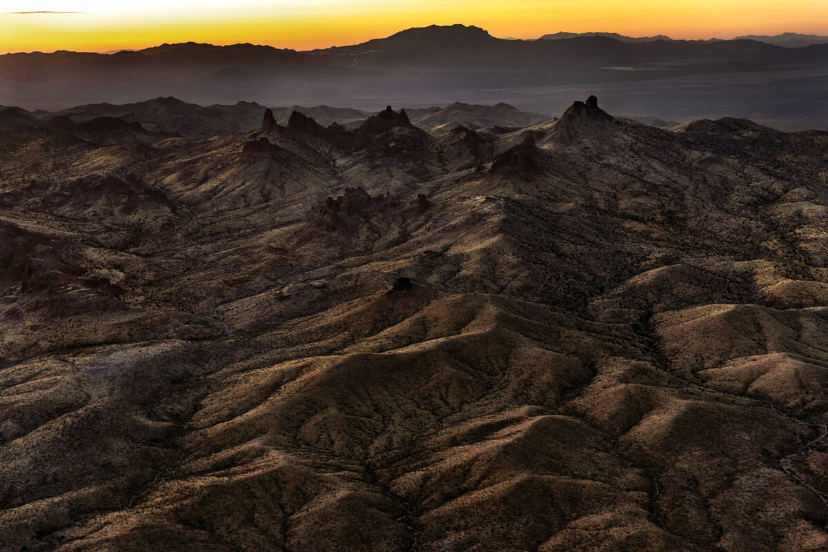 The sun sets beyond the Castle Mountains within the Avi Kwa Ame National Monument on Monday, Fe ...