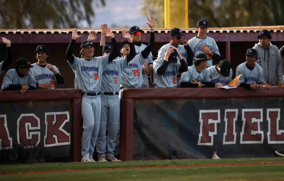 Bishop Gorman’s players cheer during the seventh inning of a baseball game against Deser ...