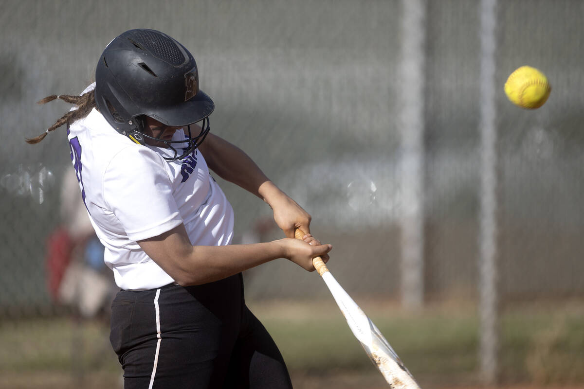 Silverado’s LeAnna Cortez hits during a high school softball game against Desert Oasis a ...