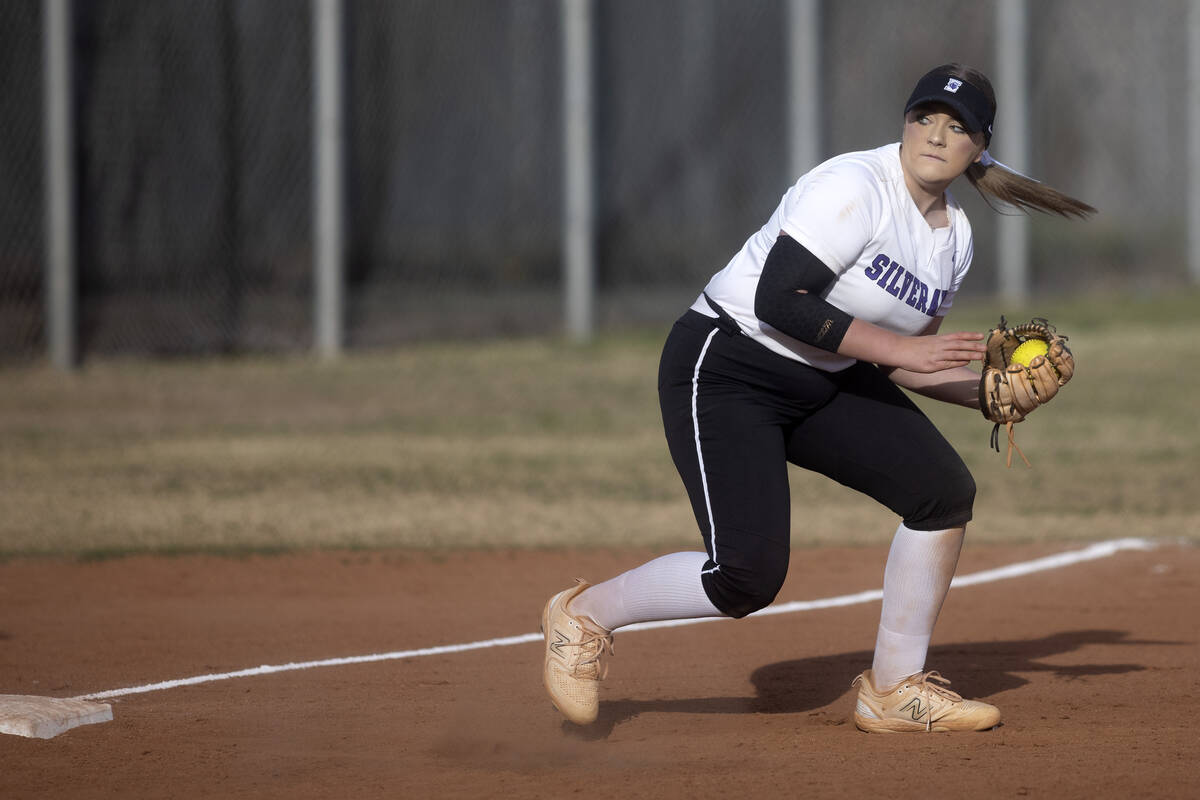Silverado’s Jordyn Bunce pivots to see if she can make an out on third during a high sch ...