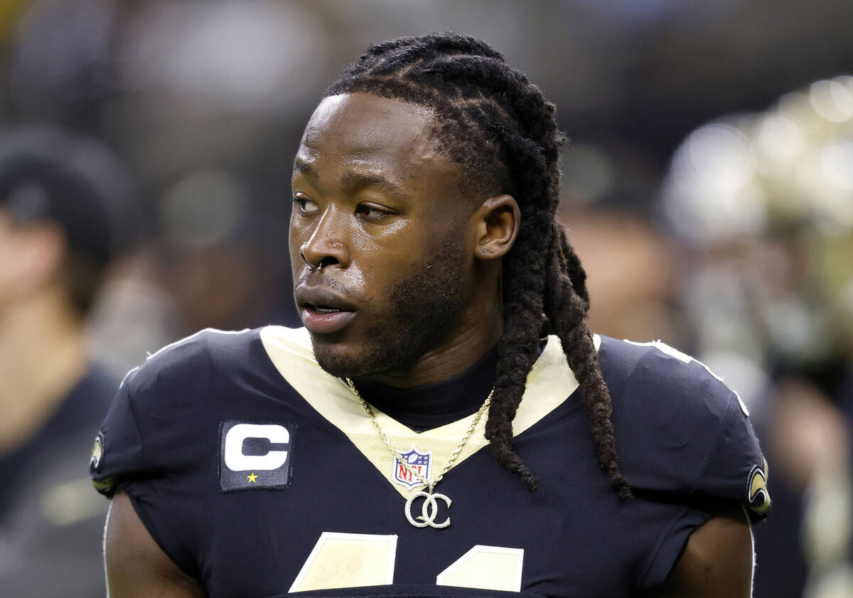 FILE - New Orleans Saints running back Alvin Kamara warms up for the team's NFL football game a ...