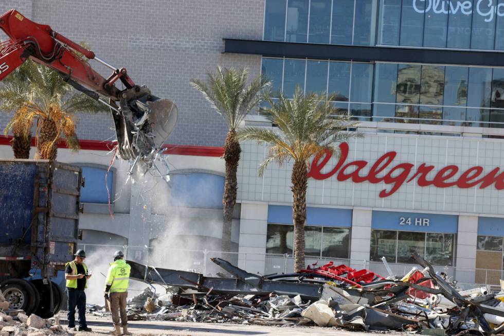 Crews clear the remains of buildings at 3755 Las Vegas Blvd. South on the Strip in Las Vegas Mo ...