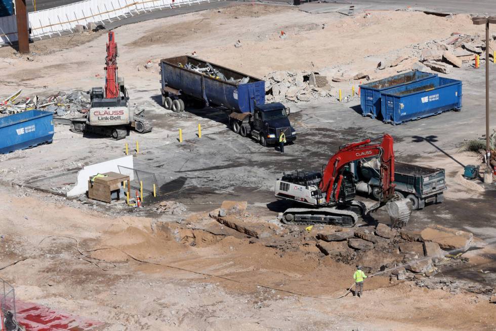 Crews clear the remains of buildings at 3755 Las Vegas Blvd. South on the Strip in Las Vegas Mo ...