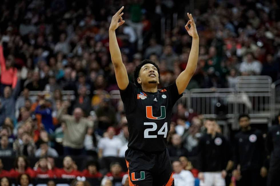 Miami guard Nijel Pack celebrates after scoring against Houston in the second half of a Sweet 1 ...