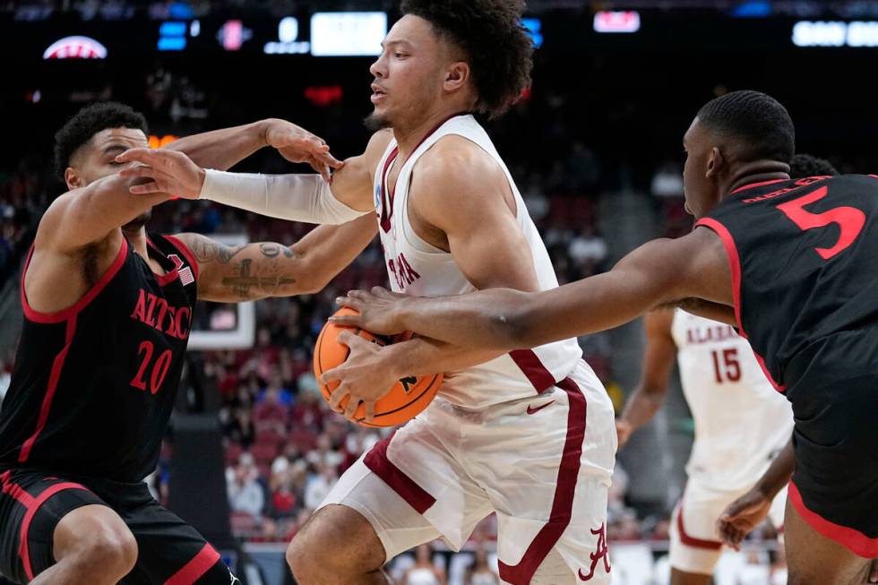 Alabama guard Mark Sears (1) drives to the basket against San Diego State guard Lamont Butler ( ...