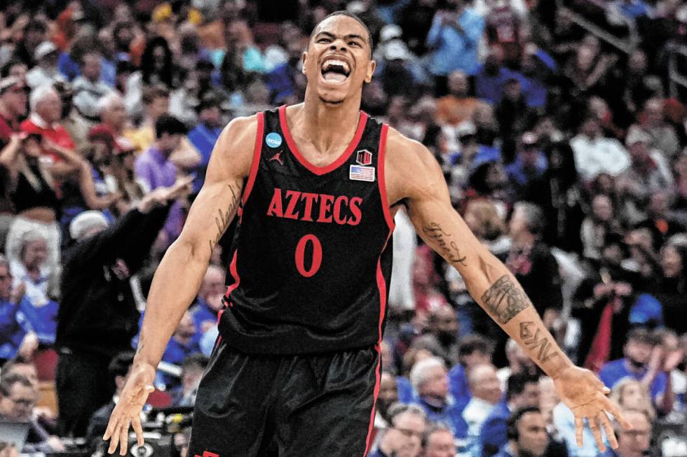 San Diego State forward Keshad Johnson (0) celebrates a win over Alabama in the second half of ...