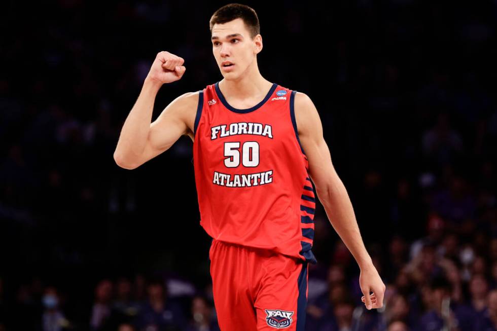 Florida Atlantic's Vladislav Goldin (50) reacts in the second half of an Elite 8 college basket ...