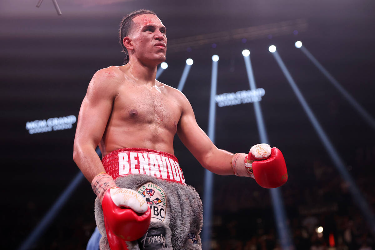 David Benavidez walks to his corner at the end of a round in the interim WBC world super middle ...