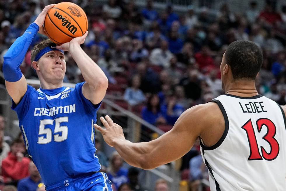 Creighton guard Baylor Scheierman (55) shoots agaimnst San Diego State forward Jaedon LeDee (13 ...