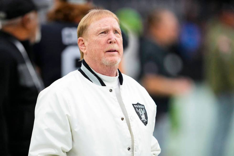 Las Vegas Raiders owner Mark Davis watches warms up before an NFL football game between the Ind ...