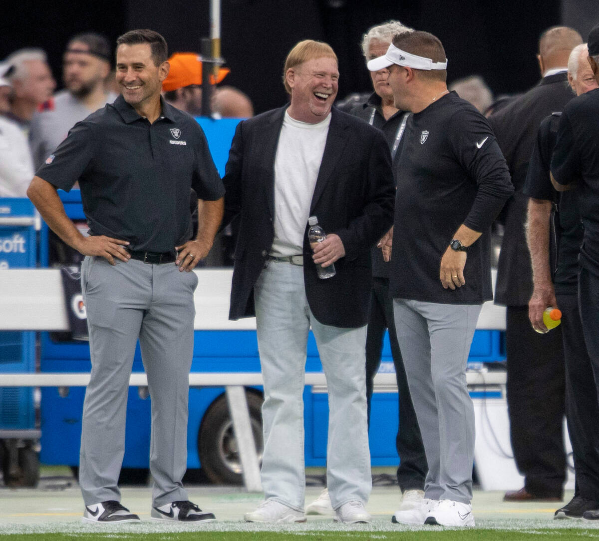 Raiders general manager Dave Ziegler, left, owner Mark Davis, center, and head coach Josh McDan ...