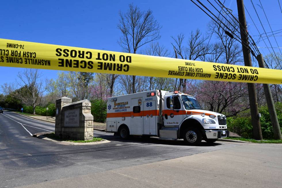 An ambulance leaves The Covenant School in Nashville, Tenn., on Monday, March 27, 2023. Officia ...