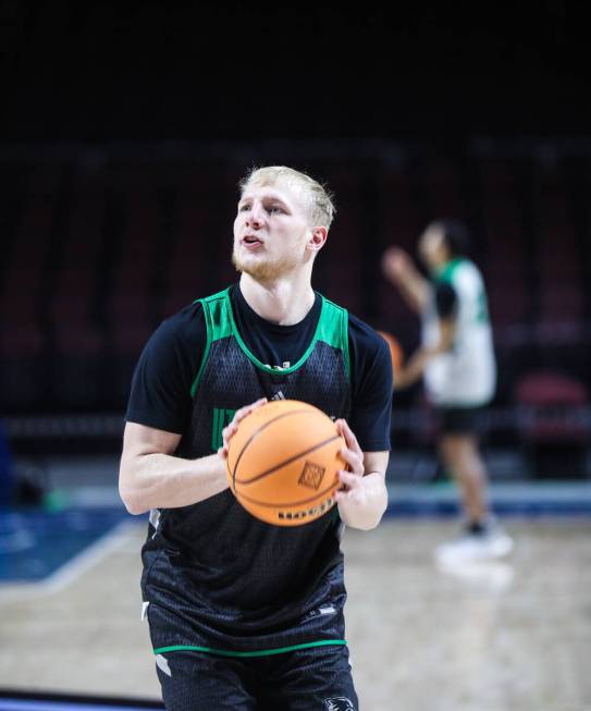 Utah Valley Wolverines player Trey Woodbury takes a shot during practice at the Orleans Arena i ...