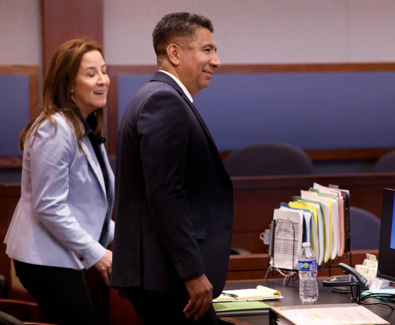 Alpine Motel Apartments former owner Adolfo Orozco, right, stands as the judge enters the court ...