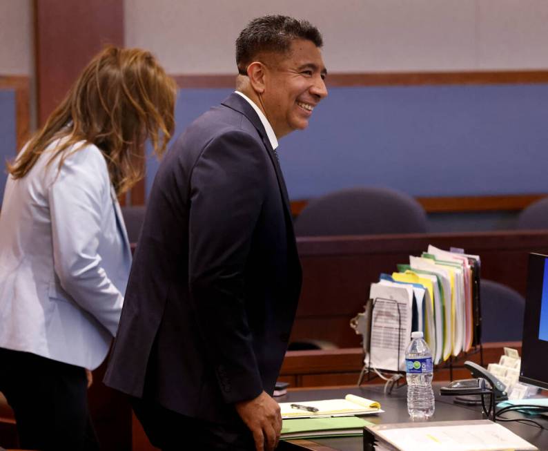 Alpine Motel Apartments former owner Adolfo Orozco, right, stands as the judge enters the court ...