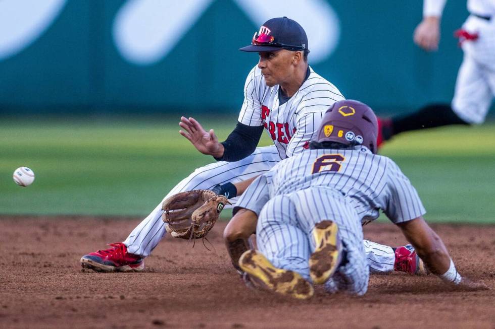 UNLV infielder Gianni Horvat (3) looks in the ball as Arizona State infielder Nu'u Contrades (6 ...