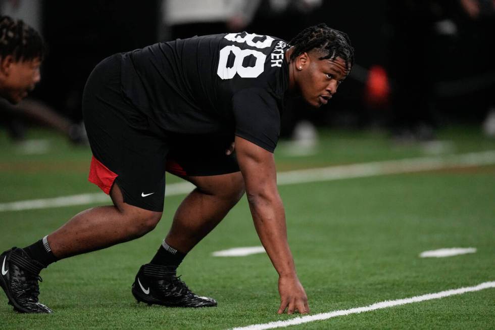 Georgia defensive lineman Jalen Carter runs football drills during Georgia's Pro Day, Wednesday ...