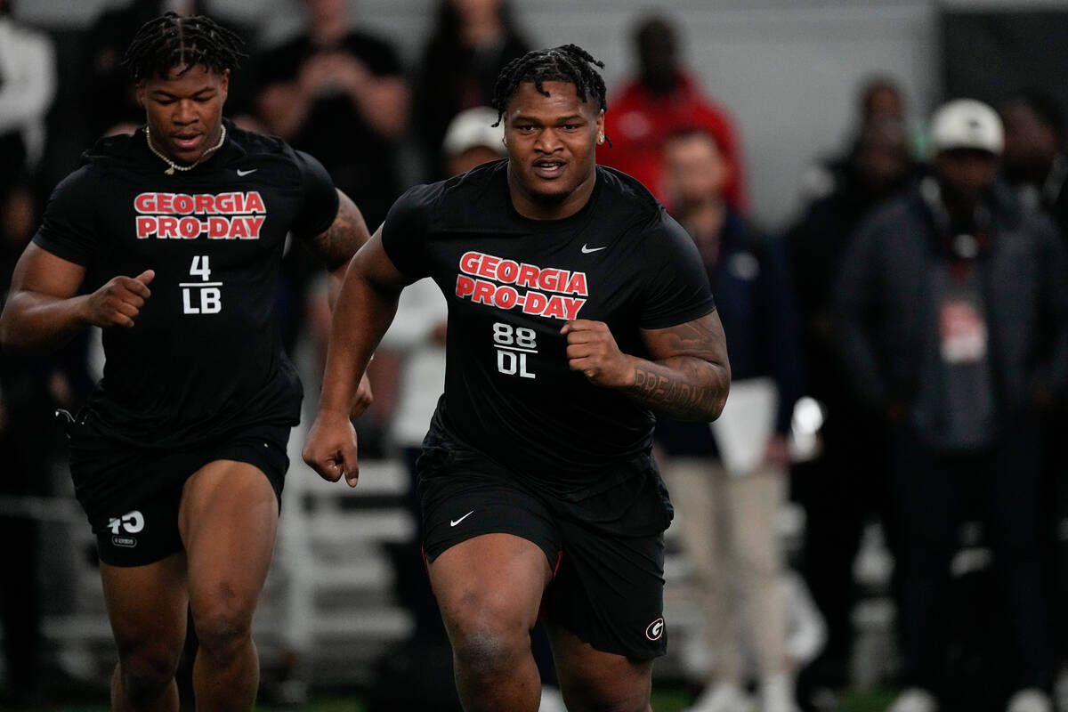 Georgia defensive lineman Jalen Carter runs football drills during Georgia's Pro Day, Wednesday ...