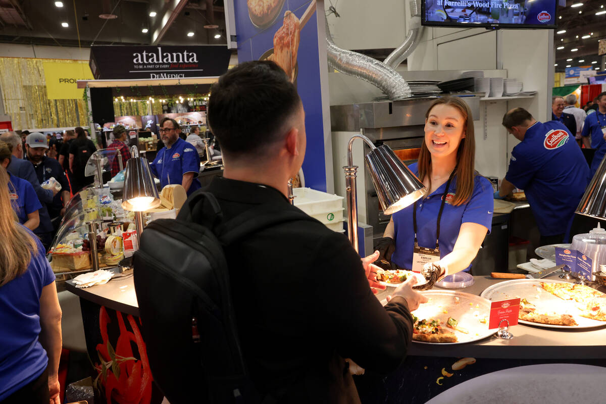 Emillie Wright of Lactalis Culinary offers pizza samples featuring Galbani Professionale cheese ...