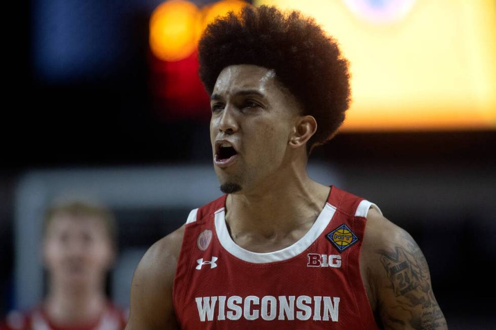 Wisconsin Badgers guard Chucky Hepburn (23) cheers after scoring a three-pointer during the fir ...