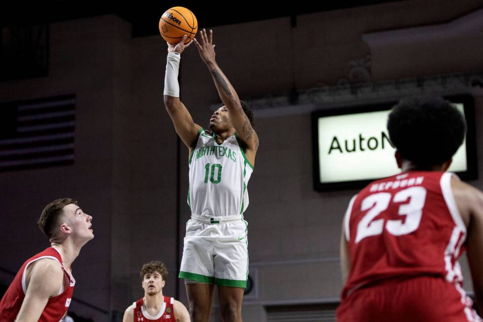 North Texas Mean Green guard Kai Huntsberry (10) shoots against Wisconsin Badgers forward Tyler ...