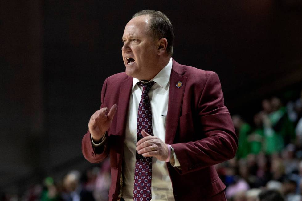 Wisconsin Badgers head coach Greg Gard shouts from the sidelines during the first half in a NCA ...