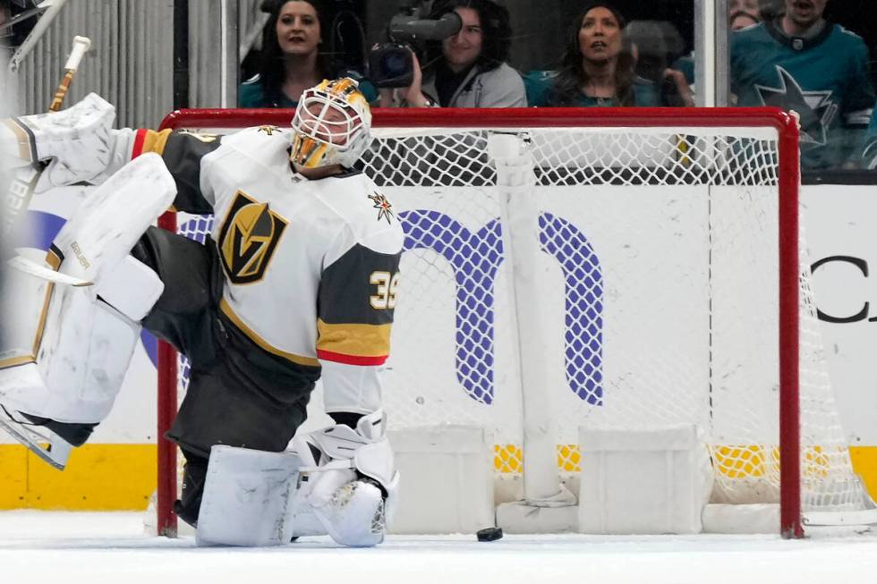 Vegas Golden Knights goaltender Laurent Brossoit (39) reacts to a goal by San Jose Sharks' Loga ...