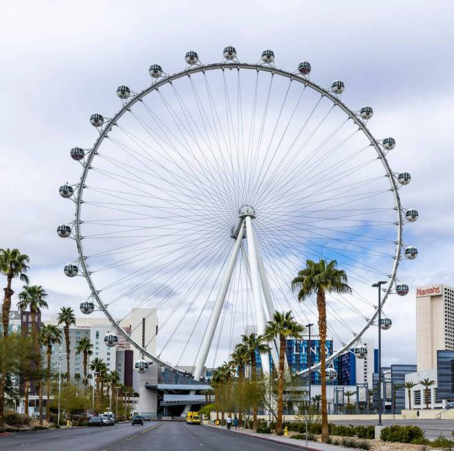 Members of the Clark County Fire Department’s heavy rescue team ascend the High Roller while ...