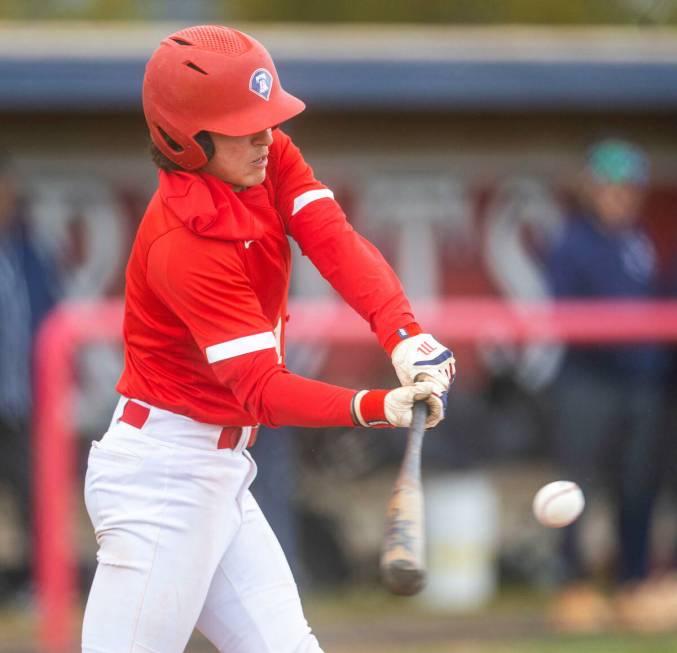 Liberty batter Dylan Fisher connects with a pitch versus Spring Valley during the second inning ...