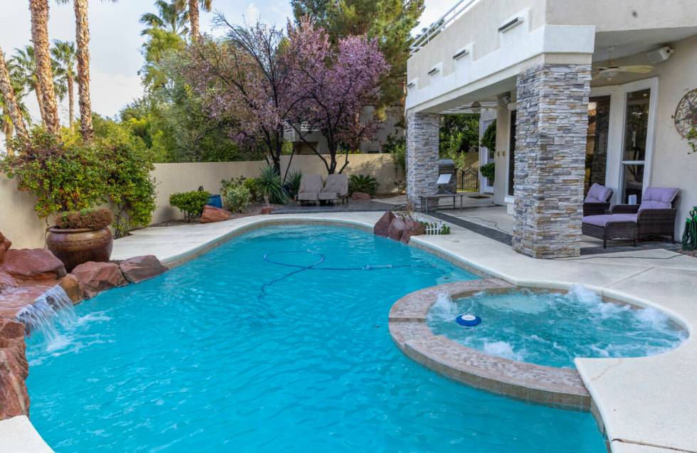 A backyard pool at a Workbnb home in Summerlin which can be a 30+ day rental for temporary work ...