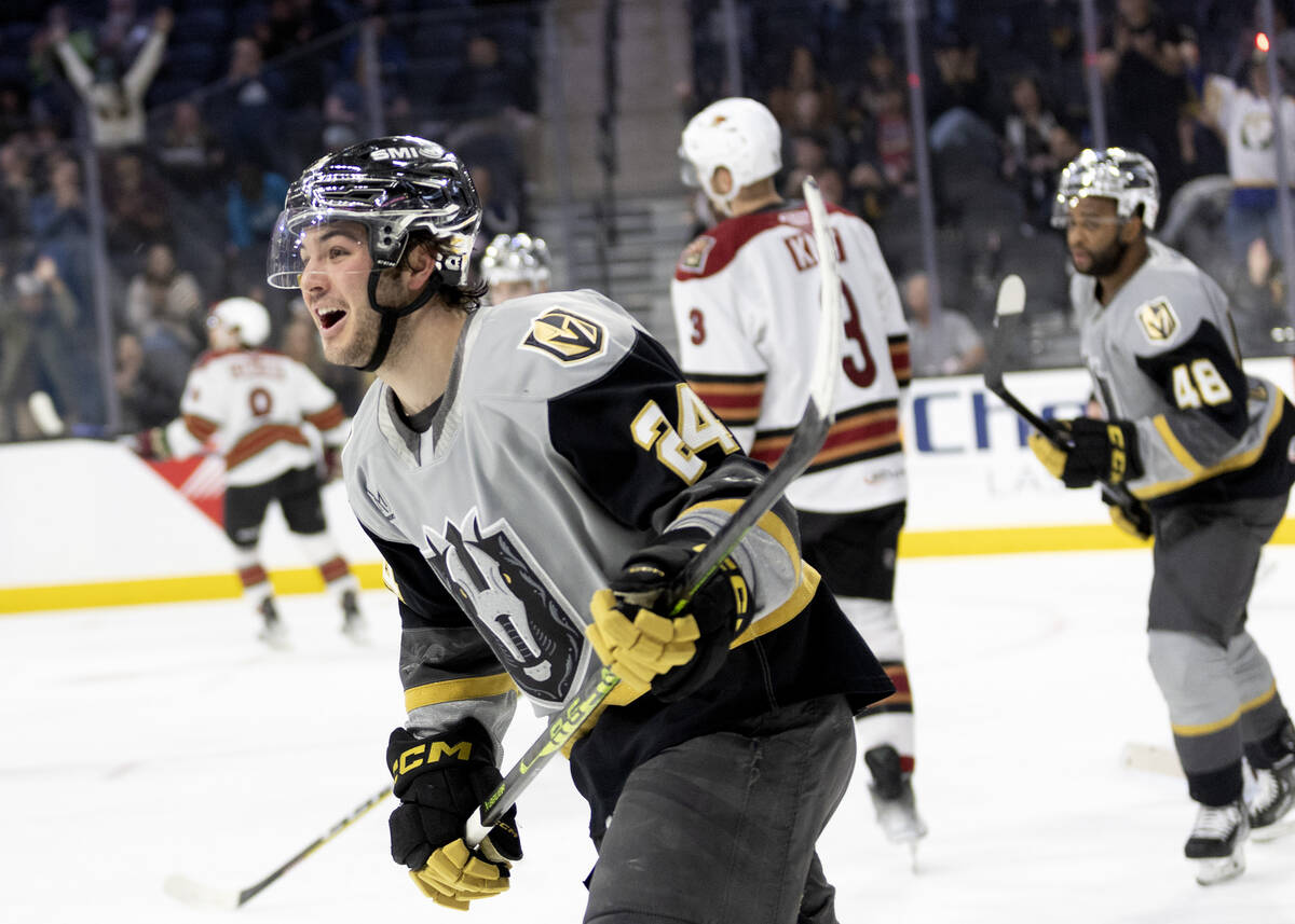 Henderson Silver Knights forward Brendan Brisson celebrates after assisting on a goal during an ...