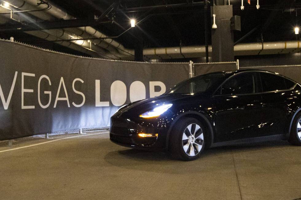 A Vegas Loop Tesla departs from the Boring tunnel passenger station at Resorts World Las Vegas ...