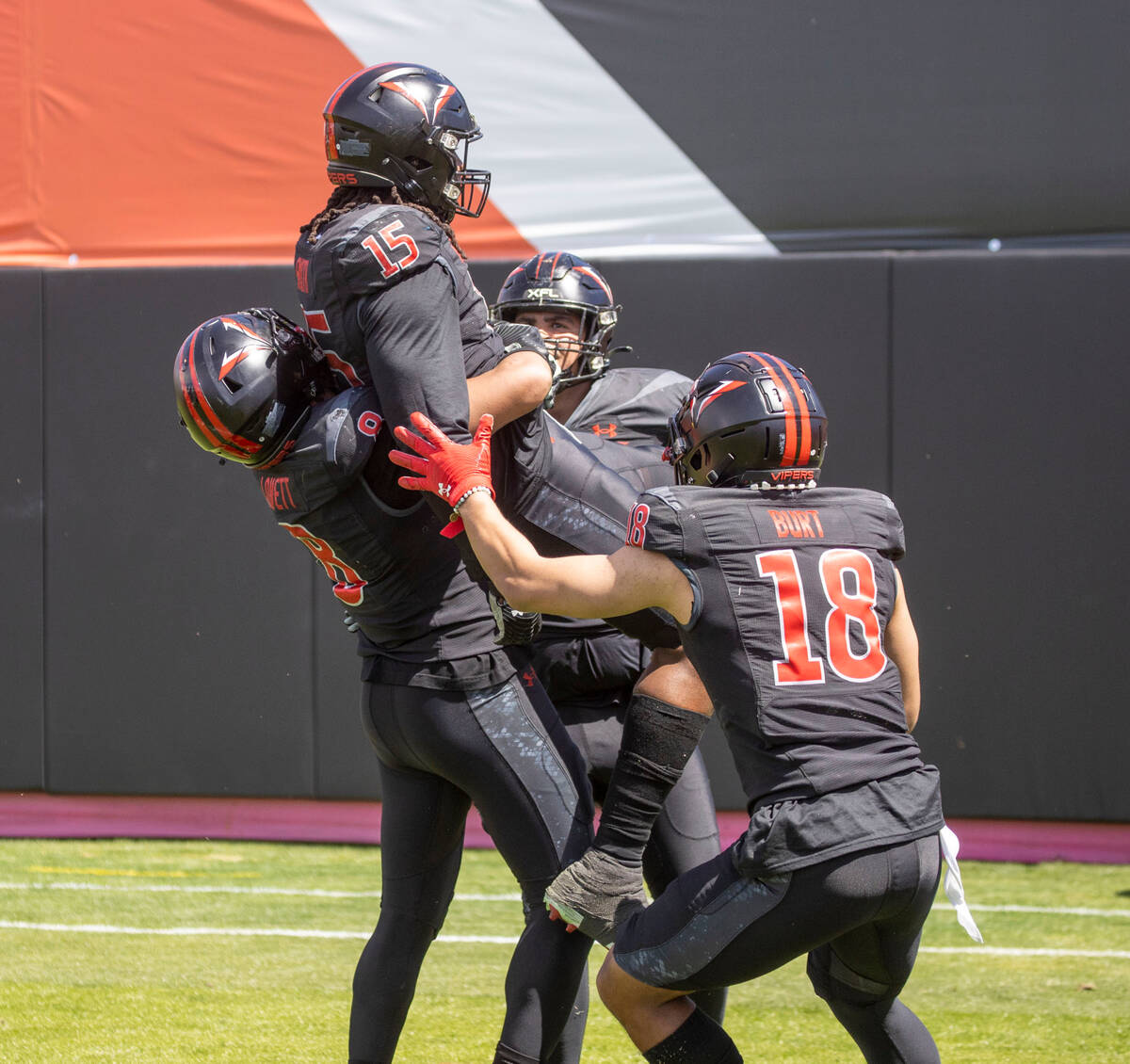 Vegas Vipers Rod Smith (15) is lifted up by running back John Lovett (8) to celebrate his touch ...