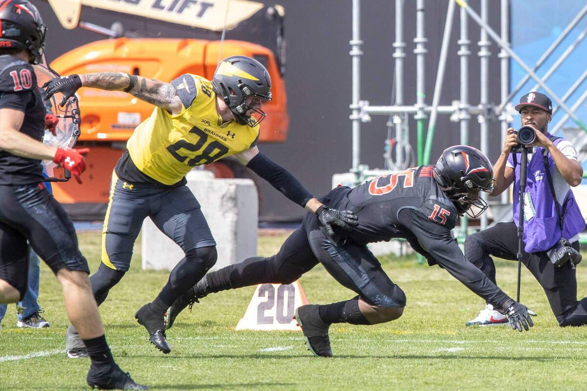 Vegas Vipers running back Rod Smith (15) dives for yards with San Antonio Brahmas defensive bac ...