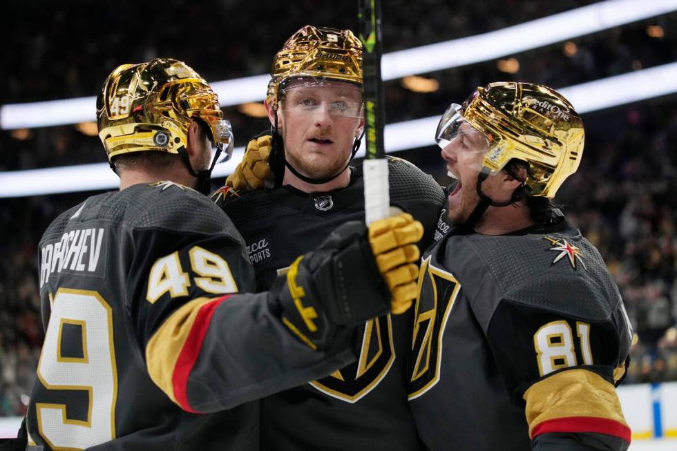 Vegas Golden Knights celebrate after center Jack Eichel, center, scored against the Columbus Bl ...