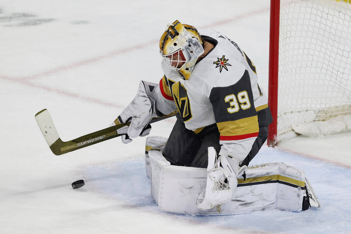 Vegas Golden Knights goaltender Laurent Brossoit blocks the puck during the first period of an ...