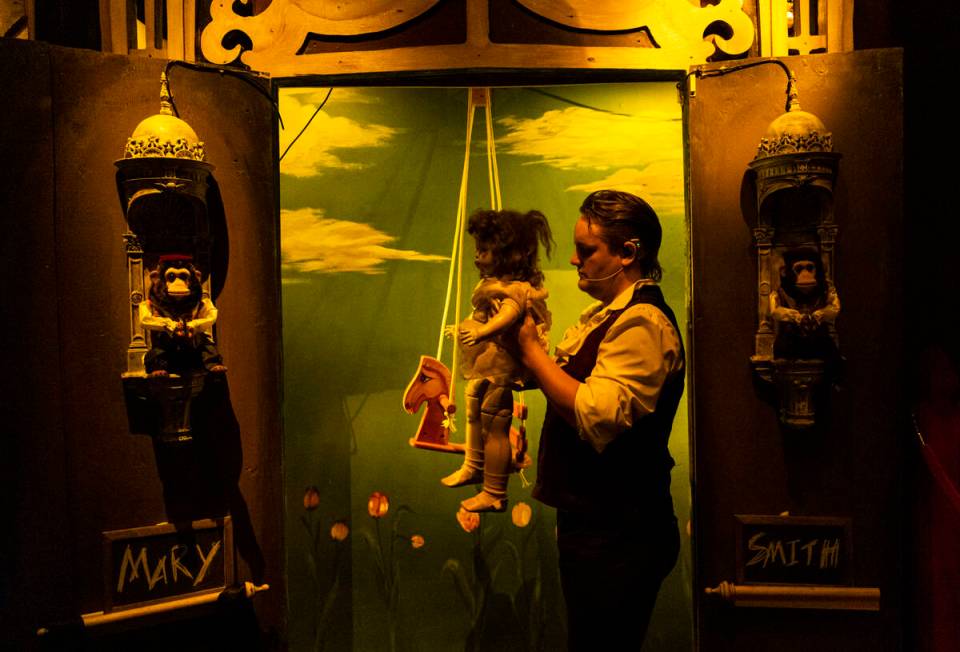 William Bradshaw holds an Edison talking doll during the The Seance Room at Lost Spirits Distil ...