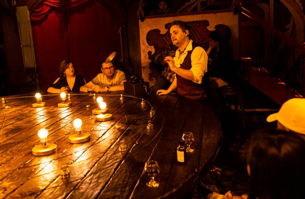 William Bradshaw, right, performs during the The Seance Room at Lost Spirits Distillery on Sund ...