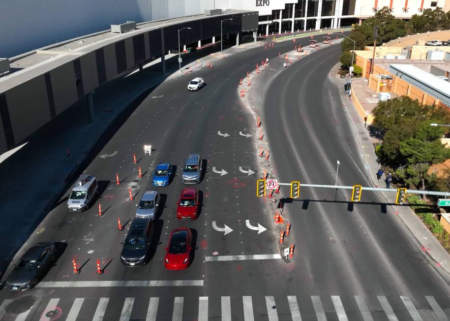 Traffic cones and road construction equipments are placed on Sands Avenue near the Venetian Exp ...