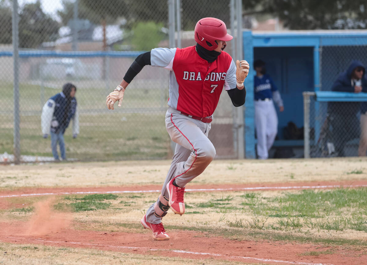 Doral Academy's Sebastian Zaman (7) runs to first base during a baseball game at Desert Pines H ...