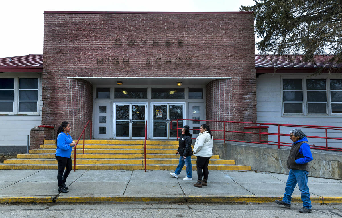 (From left) Owyhee Combined School Assistant Principal Lynn Manning John gives a tour of the ca ...