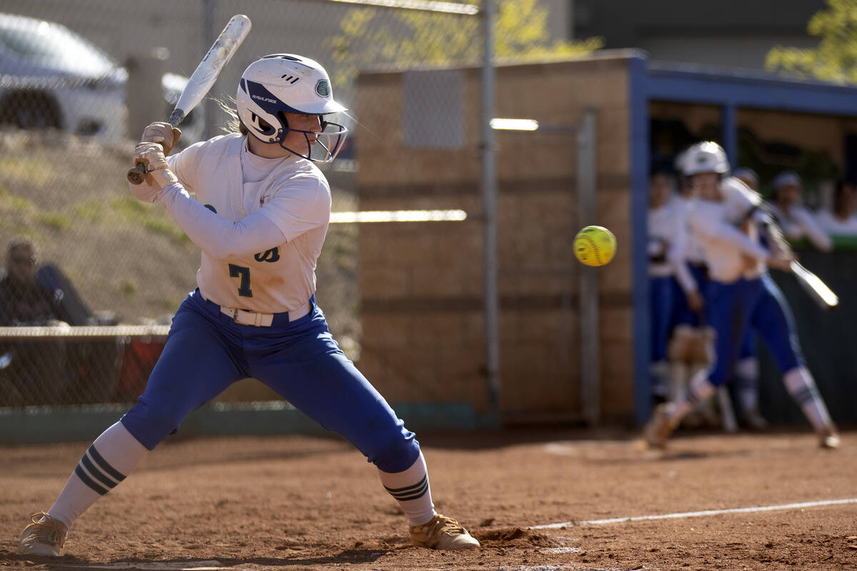 Green Valley’s Aspyn Beattie reads a pitch from Faith Lutheran during a high school soft ...