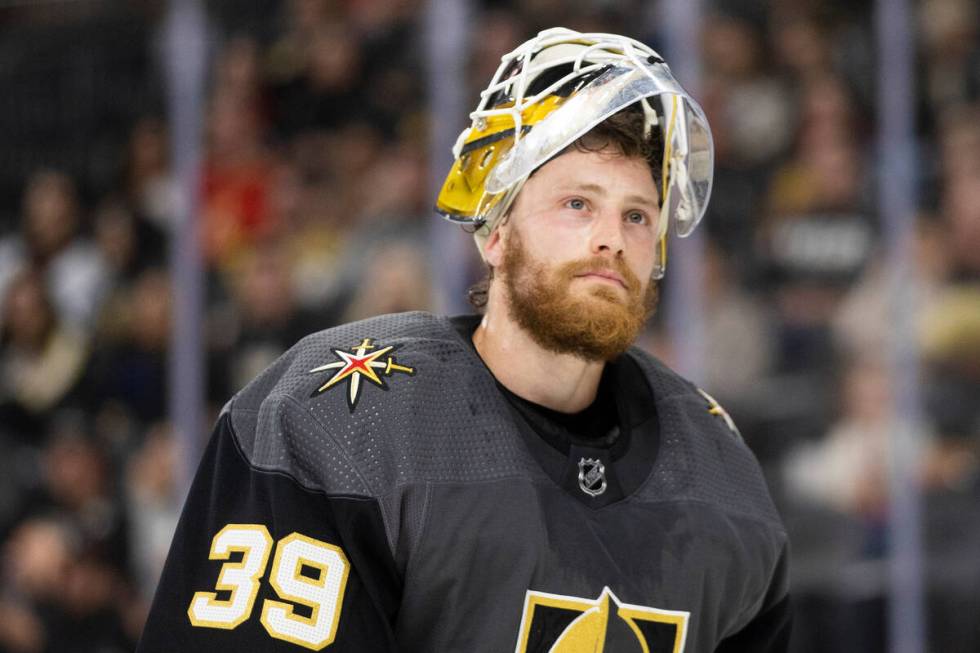 Golden Knights goaltender Laurent Brossoit (39) skates around goal in the second period during ...